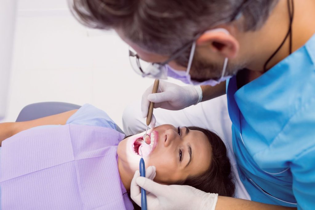 Dental Implants routine checkup at Burlington Family Dentists in Burlington