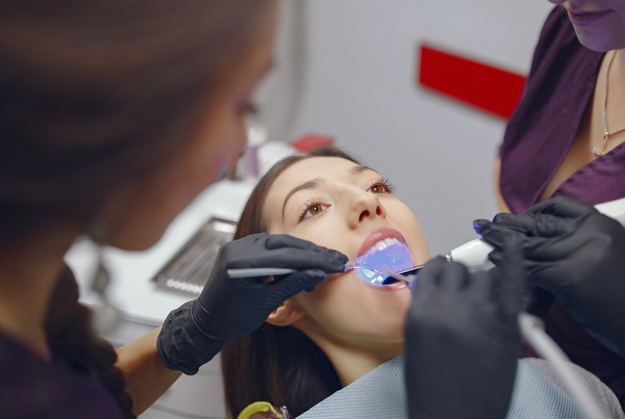 Young woman undergoing periodontal surgery consultation.